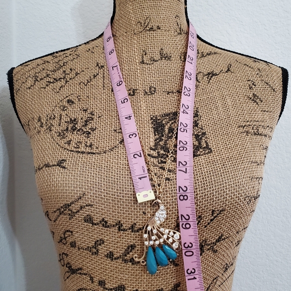 Gold tone peacock with faux teal gemstones and clear rhinestones necklace - Picture 5 of 5